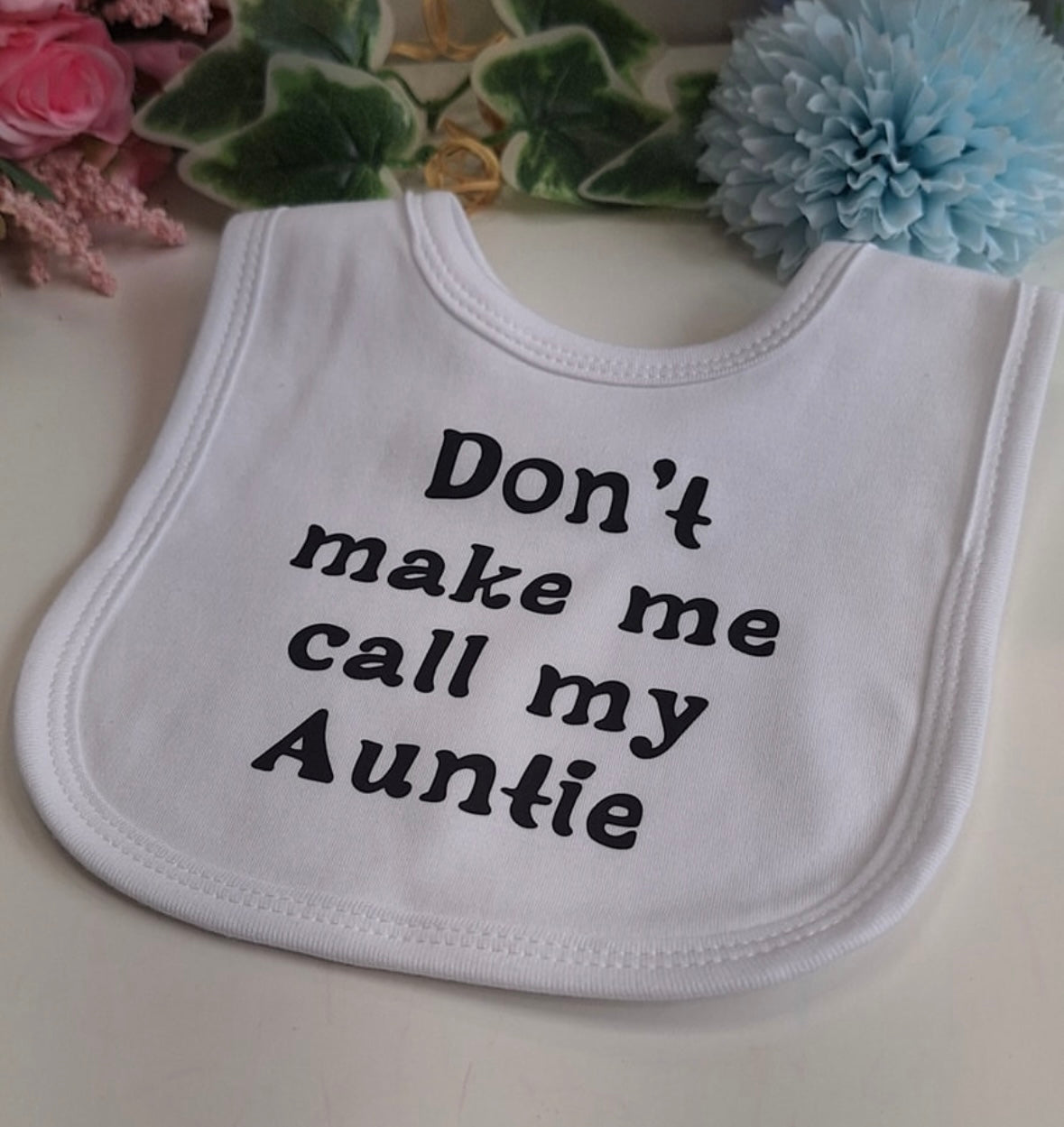 white "Don't make me call my auntie" Baby Bib