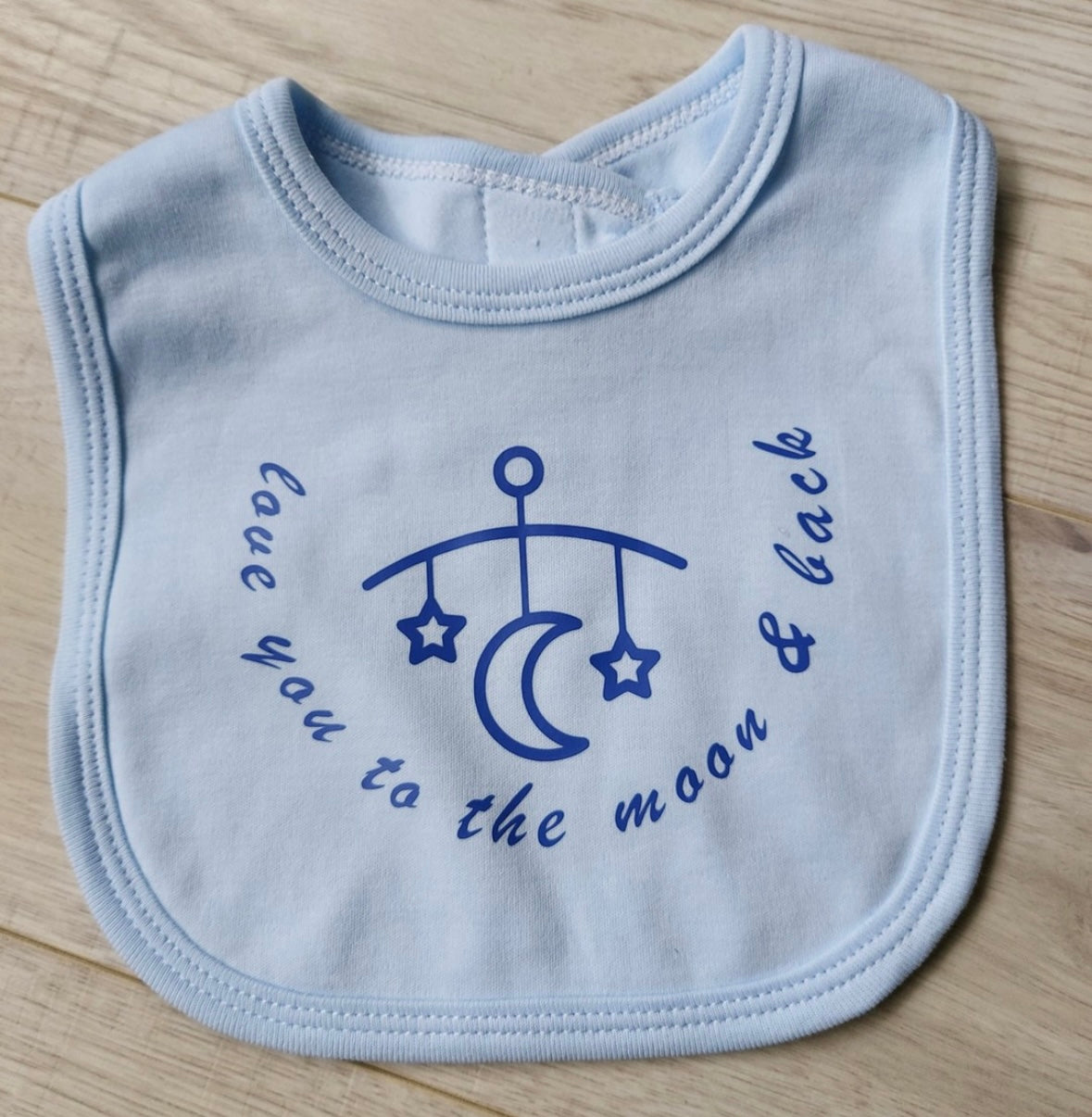 ''love you to the moon and back'' slogan Blue baby bib