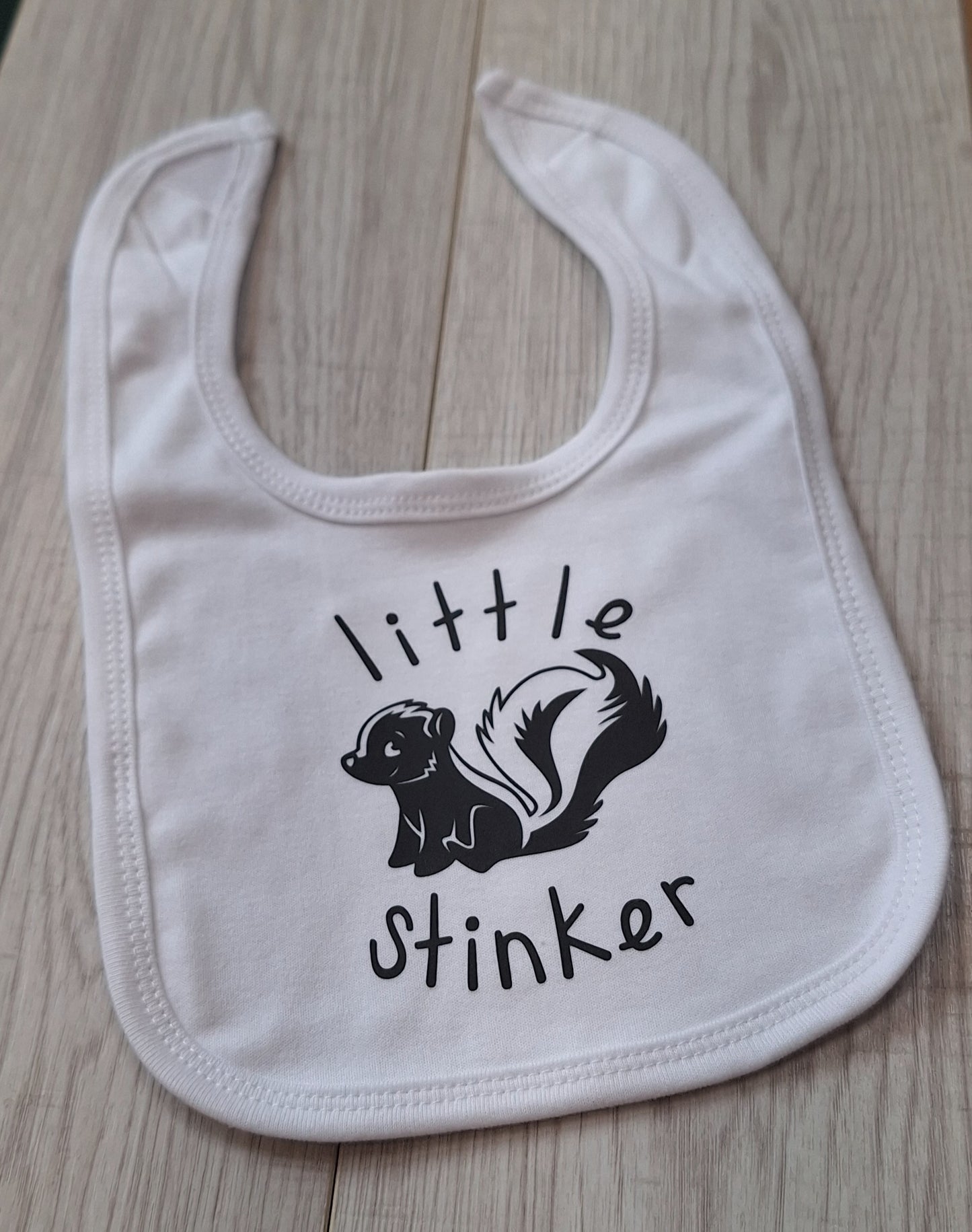 "Little Stinker" White Cotton Baby Bib