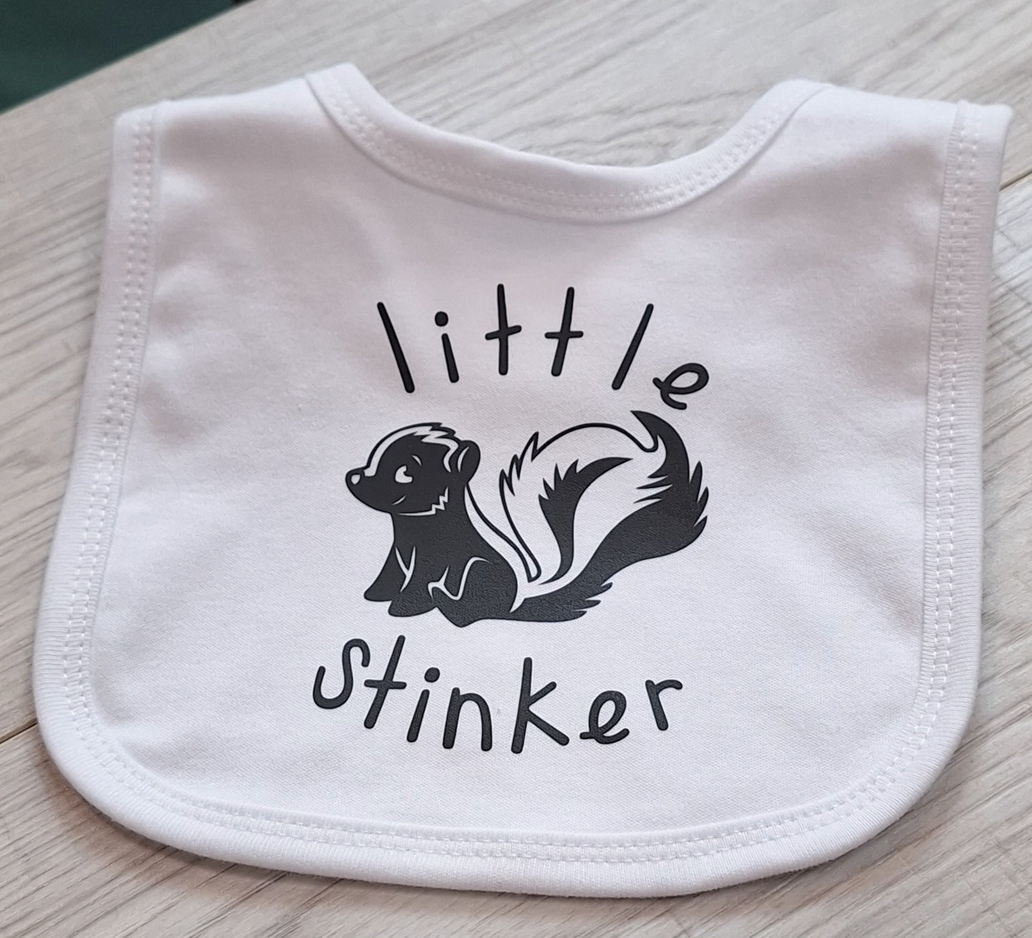 "Little Stinker" White Cotton Baby Bib